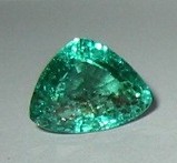 Trilliant cut Emerald